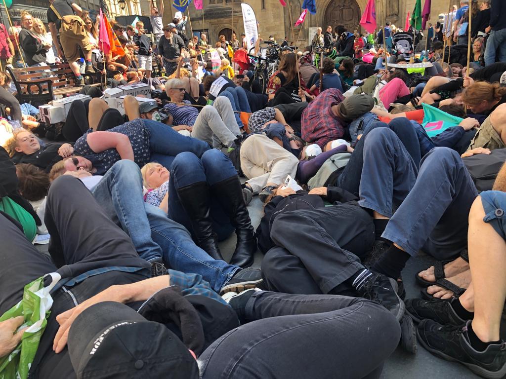 ﻿Activism in Bath, a die-in staged in front of the Abbey, by Extinction Rebellion. 17th August 2019